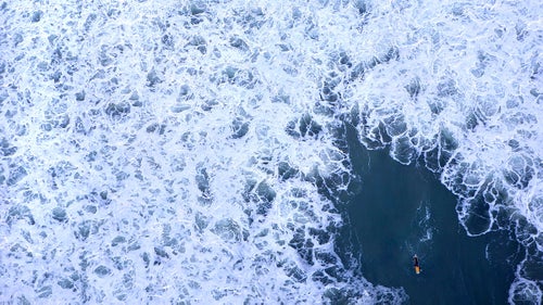 Drones have allowed just about anyone to gain an aerial perspective. Donald Miralle’s images show you why these unmanned aircraft might change photography forever—and why a helicopter is still pretty handy, too.    Photo: A surfer in whitewater during a large swell at Swamis Beach.